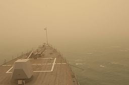 A dust storm envelops USS Nitze